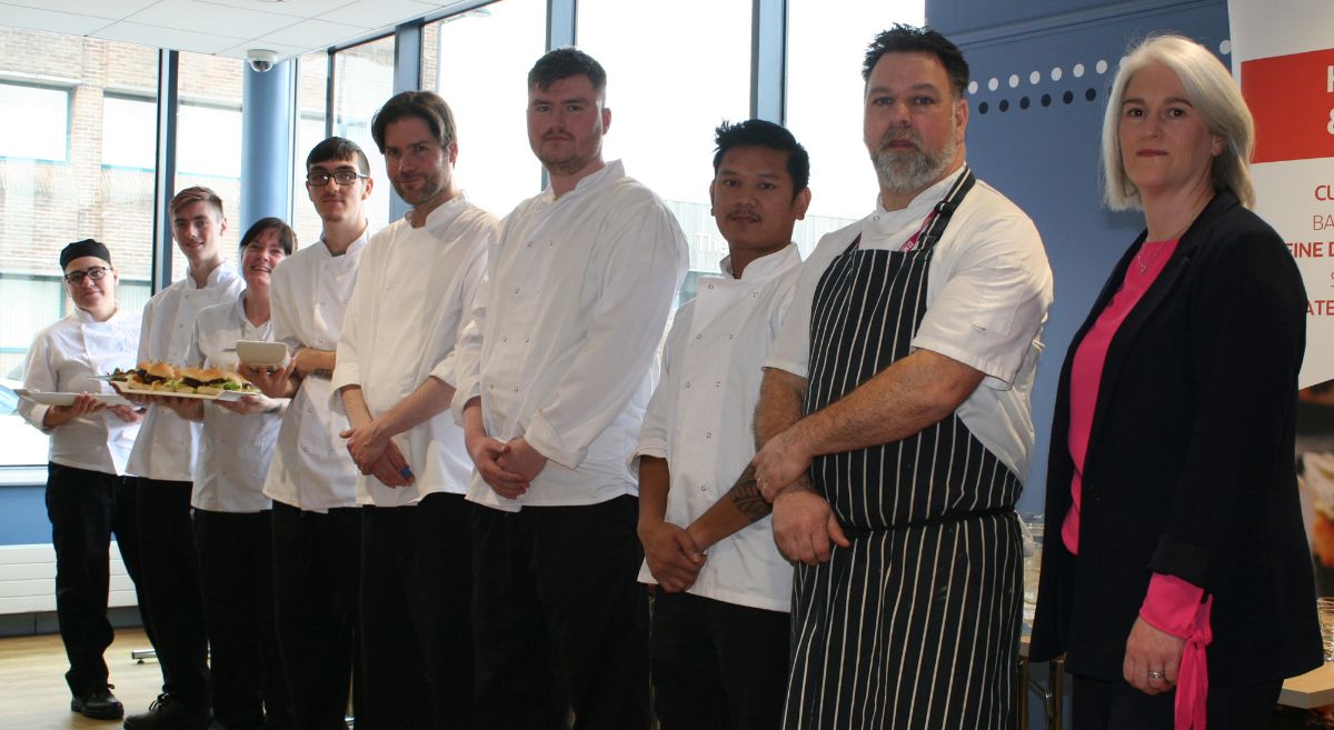 Participants of the Chef Bootcamp, Toma Zukaitiene, Mitchell Gribben, Carlene Baxter,  Harrison Gribben, Michael Killen, Daniel Gherardi and  Damdin Soath with Friedrich Machala, Chef Lecturer, SERC and Patricia McPolin, Newry, Mourne & Down District Council.